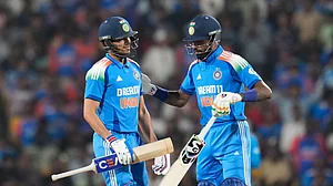 AP Photo/Aijaz Rahi : India's Shubman Gill, left, walks off the field after losing his wicket during the first one day international cricket match between India and England at Vidarbha Stadium in Nagpur.