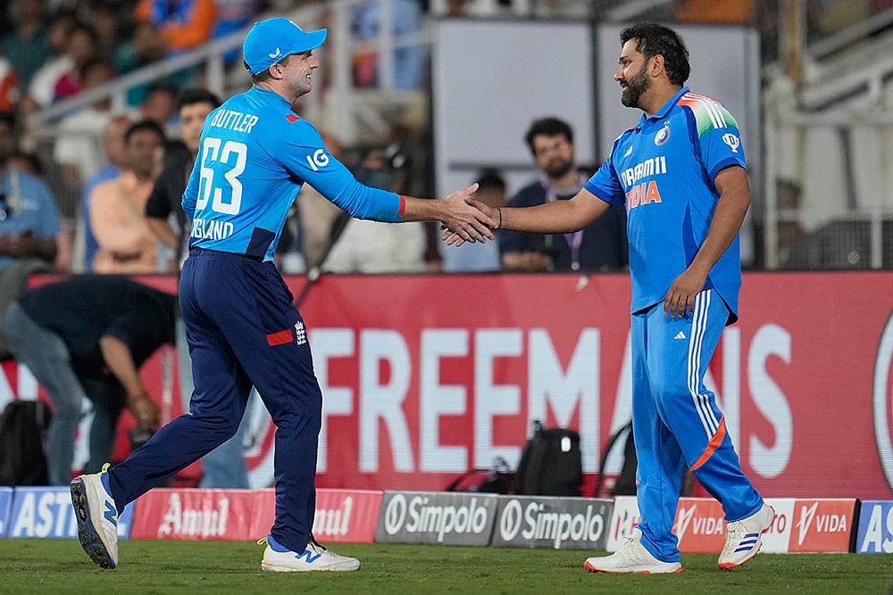 | Photo: AP/Aijaz Rahi : IND Vs ENG 1st ODI: Jos Buttler and Rohit Sharma greet each other 