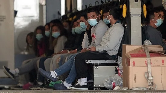 The US sent back Indian deportees in a handcuffed and chained condition