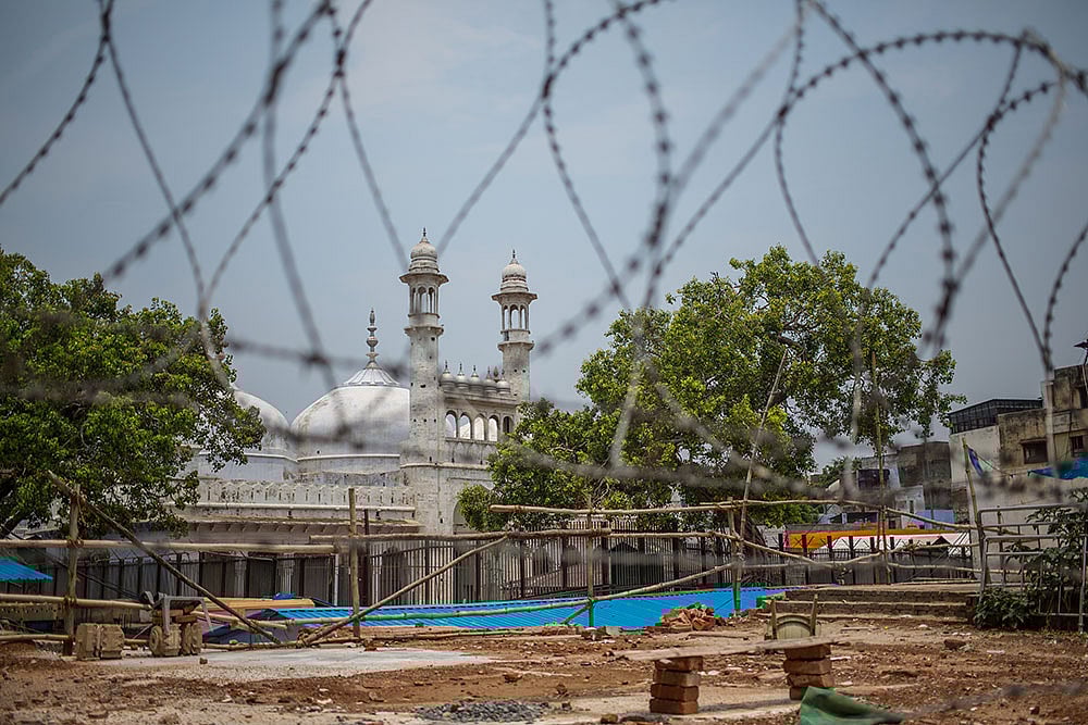 A view of the famous Gyanvapi mosque behind barbwire in Varanasi.
