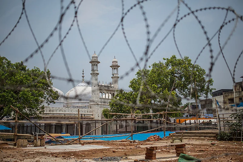 A view of the famous Gyanvapi mosque behind barbwire in Varanasi.