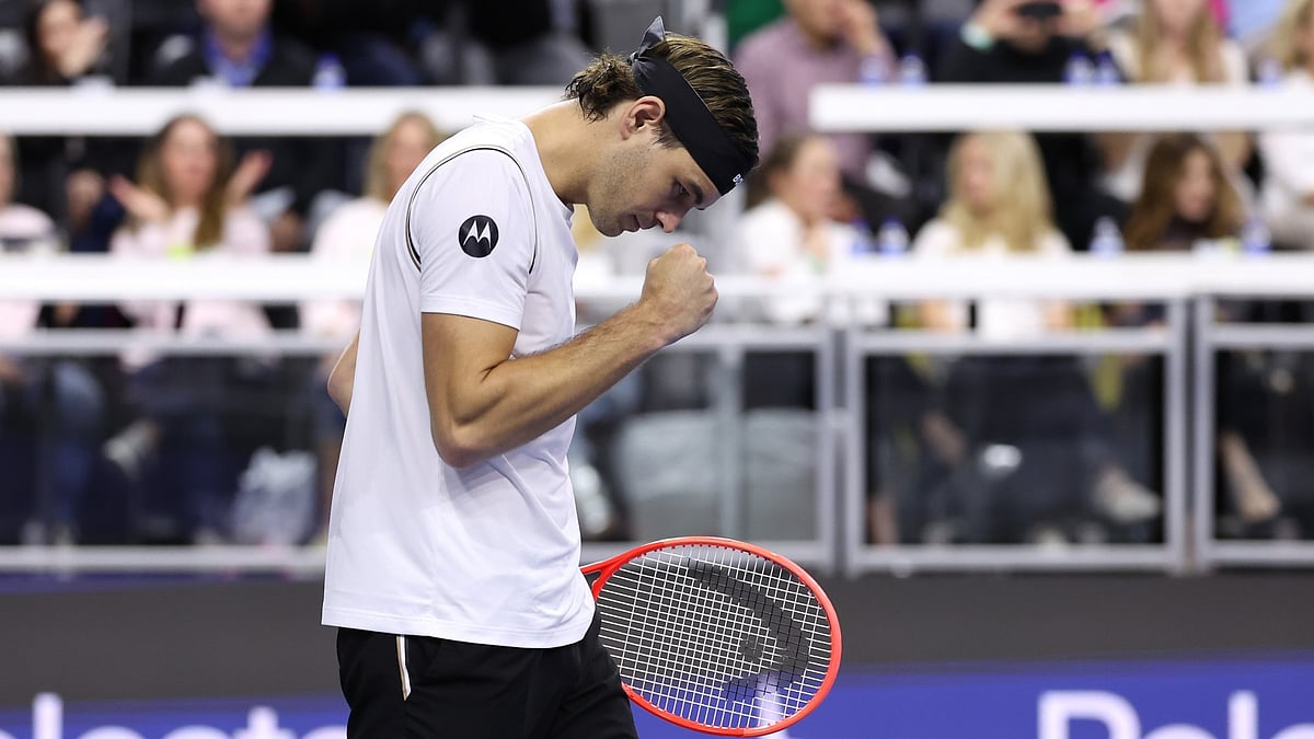 Taylor Fritz celebrates victory at the Dallas Open