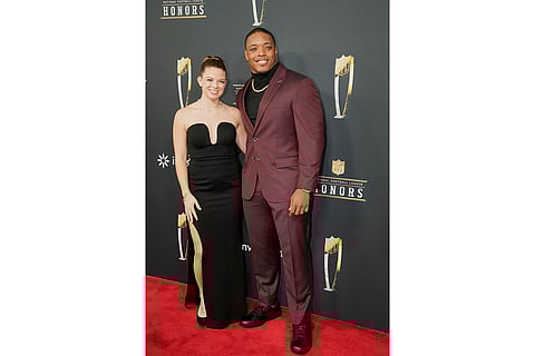 NFL Honors award show: Minnesota Vikings' C.J. Ham and wife Stephanie pose on the red carpet