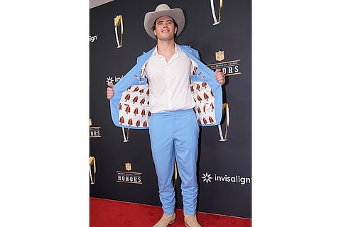 NFL Honors award show: Cameron Dicker, of the Los Angles Chargers, pose on the red carpet
