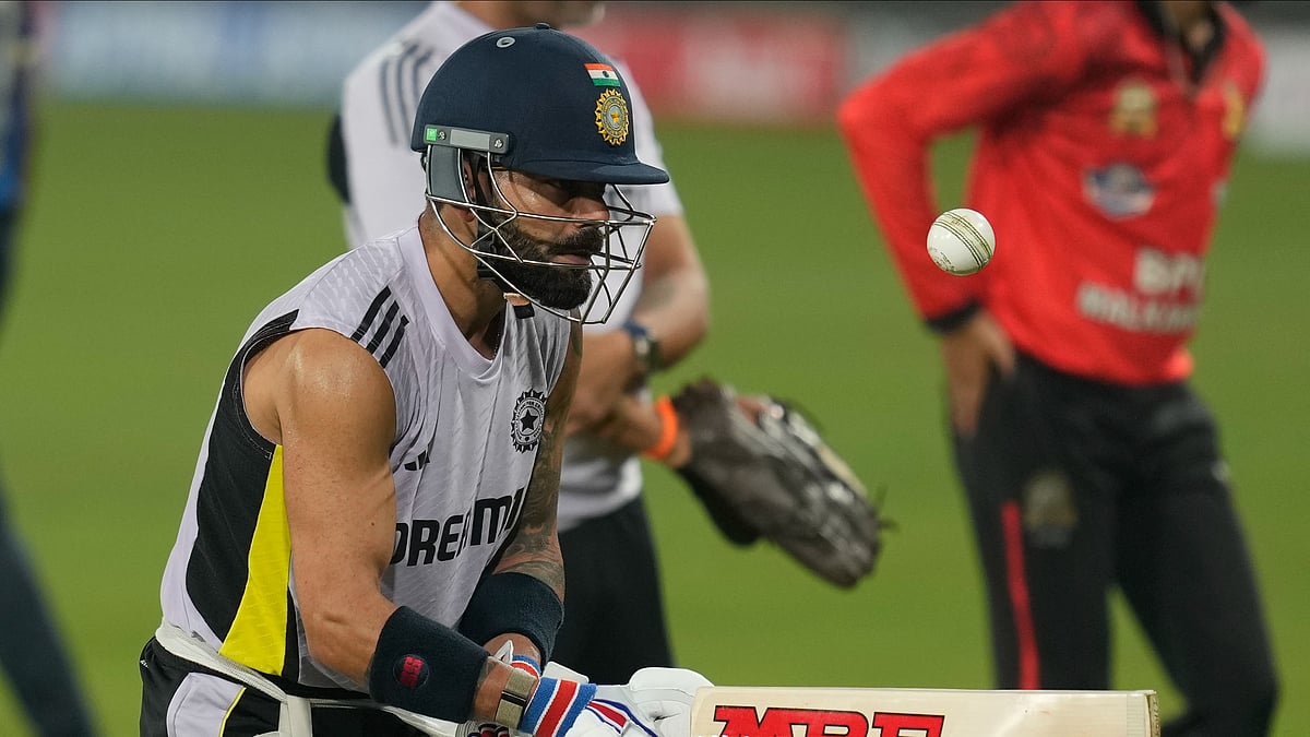 AP Photo/Rafiq Maqbool : India's Virat Kohli attends a training session ahead of the second one-day international cricket match between India and England in Cuttack.