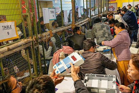 Poll officials count votes for Delhi polls