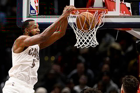 NBA 2024-25: Cavaliers forward Evan Mobley (4) dunks