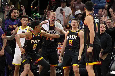 NBA 2024-25: Suns guard Grayson Allen (8) celebrates with teammates after hitting a three point shot