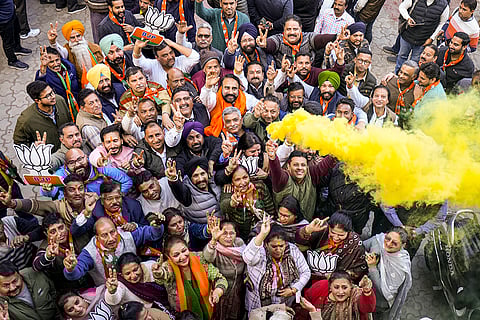BJP supporters amid Delhi polls vote counting
