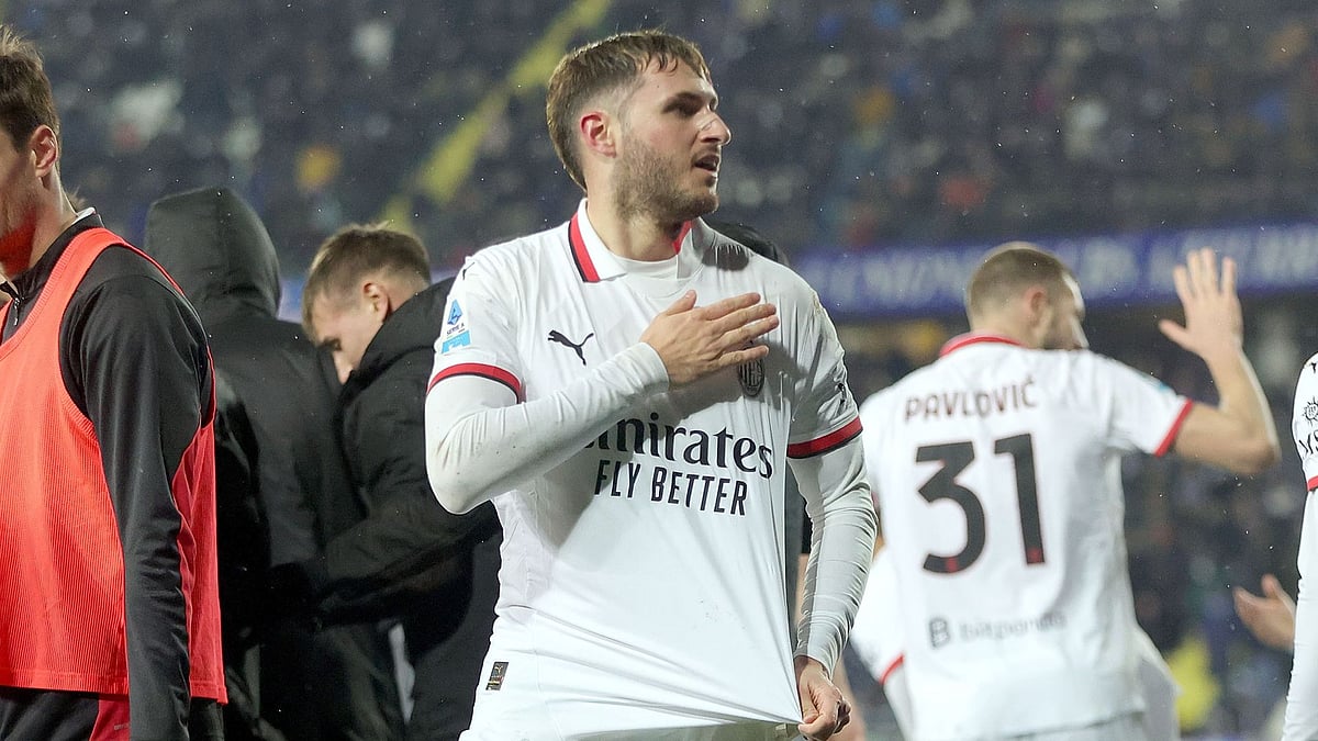 Gimenez celebrates his first goal for Milan - null