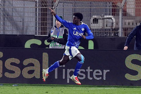 Serie A: Como 1907's Diao Diaoune Assane celebrates scoring