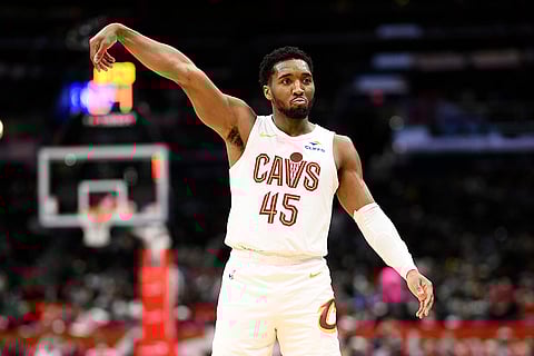 NBA 2024-25: Cavaliers guard Donovan Mitchell looks at the crowd after he made a 3-point basket