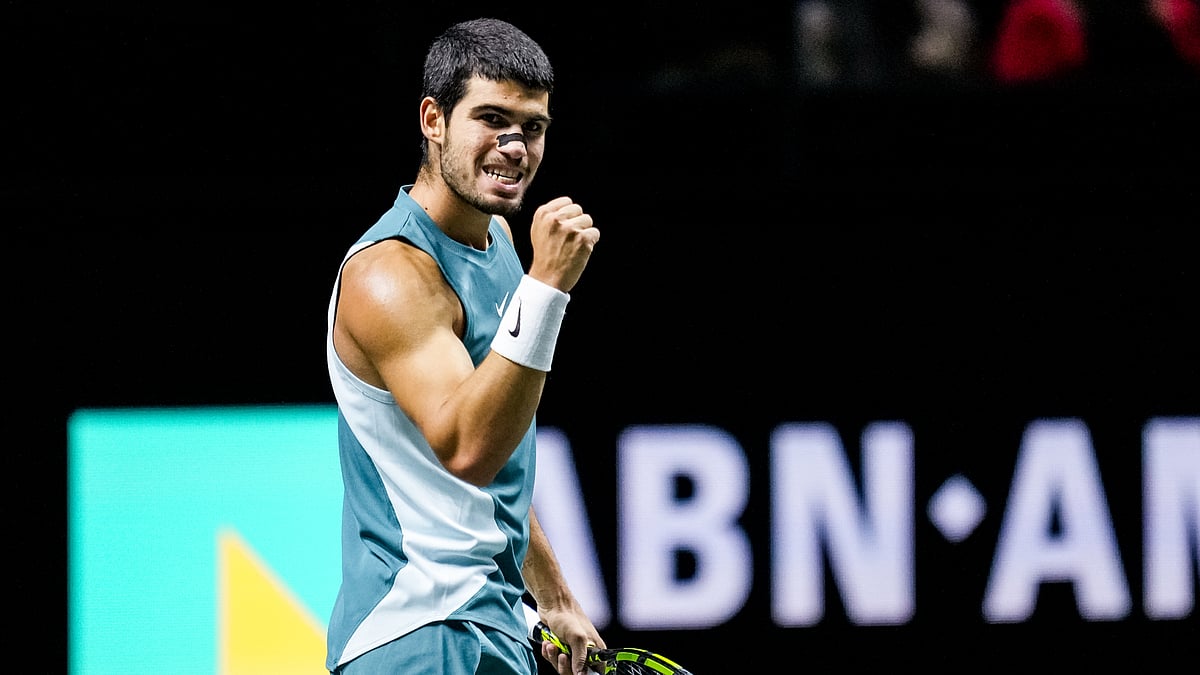 Carlos Alcaraz celebrates after beating Hubert Hurkacz