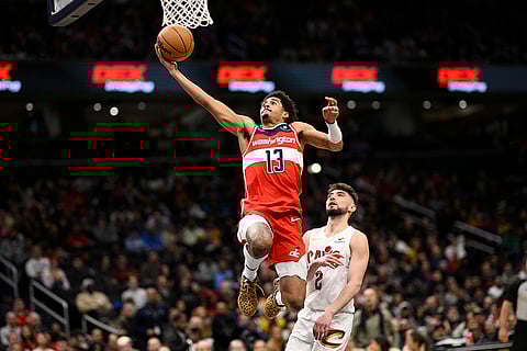 NBA 2024-25: Wizards guard Jordan Poole (13) goes to the basket