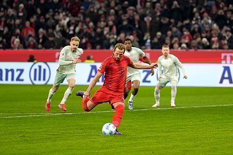 Bundesliga 2024-25: Bayern's Harry Kane on his way to scoring on a penalty