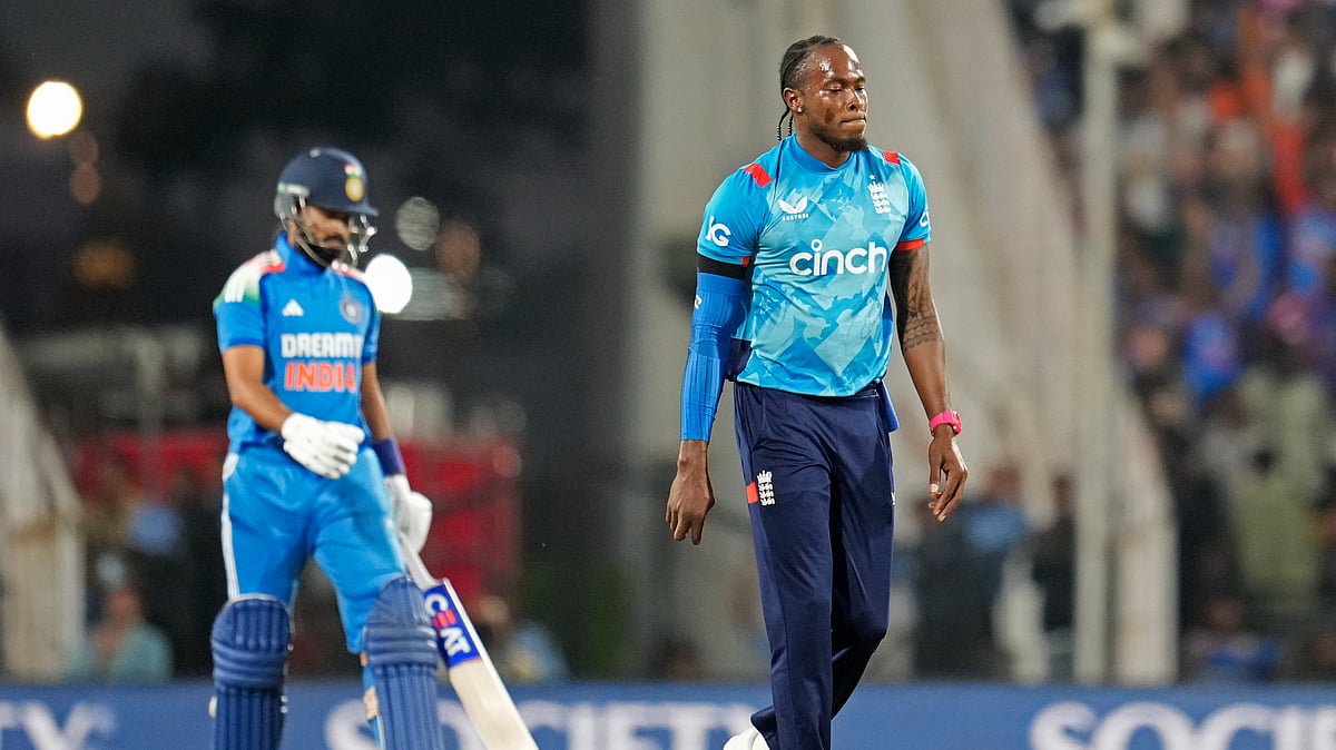 AP Photo/Aijaz Rahi : England's Jofra Archer reacts after India's Shreyas Iyer, left, hit a boundary on his delivery during the first one-day international cricket match between India and England at Vidarbha Stadium in Nagpur.