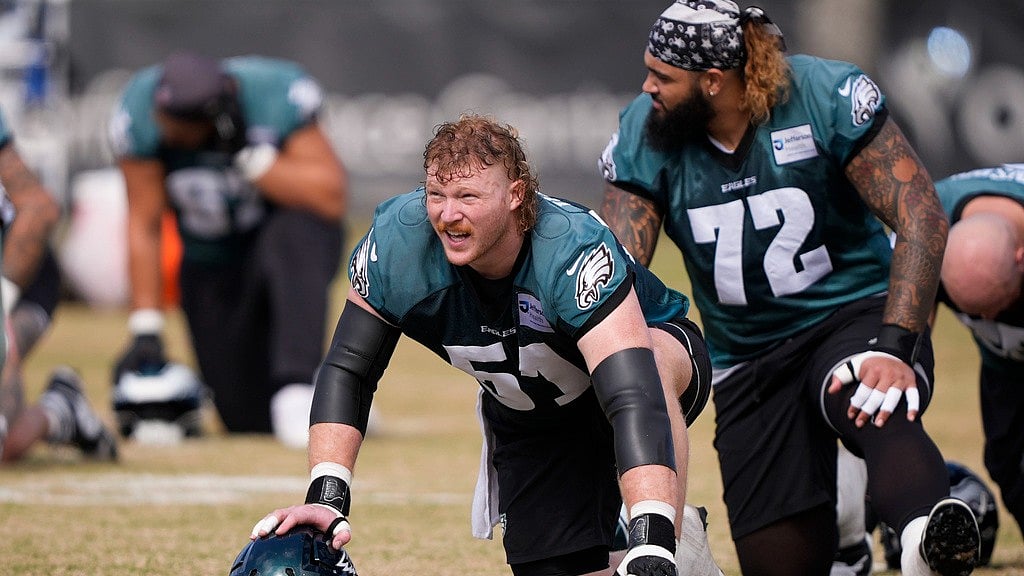 AP : Philadelphia Eagles centre Cam Jurgens (51) warms up during during an NFL practice session in New Orleans.