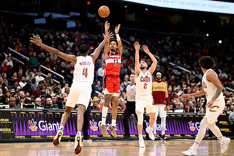 NBA 2024-25: Wizards guard Colby Jones (1) shoots against Cleveland Cavaliers