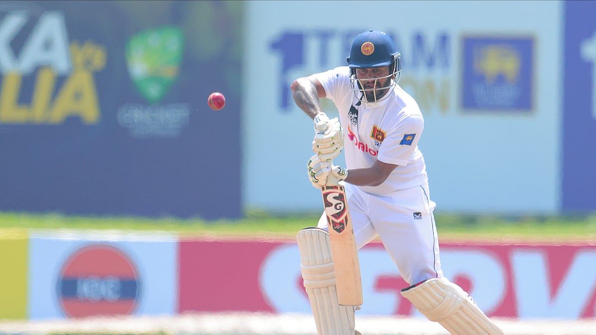 AP Photo/Lahiru Harshana : Sri Lanka's Dimuth Karunaratne plays a shot during the second test cricket match between Sri Lanka and Australia in Galle.
