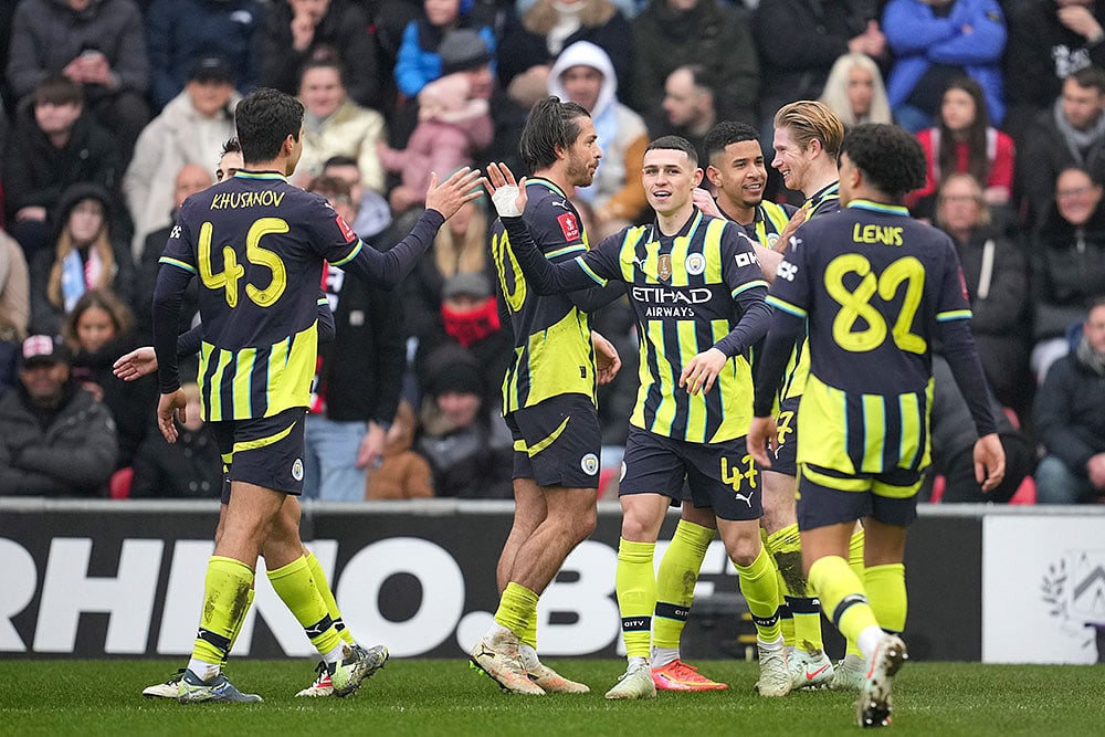 | Photo: AP/Kin Cheung : FA Cup: Manchester City vs Leyton Orient