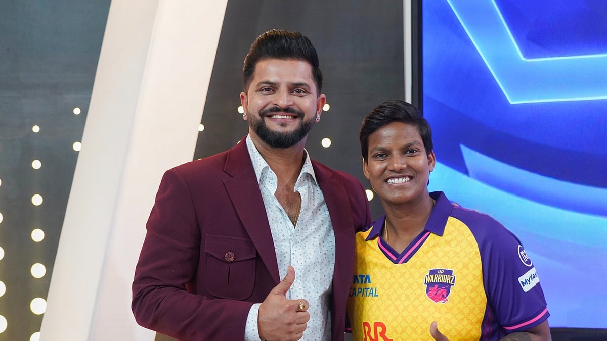 Photo: Special Arrangement : Suresh Raina with new UP Warriorz captain Deepti Sharma for the WPL 2025.