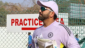 | Photo: PTI : Indian captain Rohit Sharma in practice.