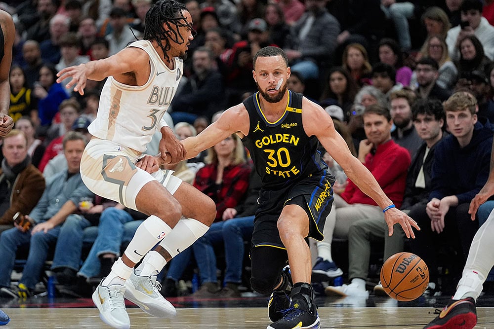 | Photo: AP/Erin Hooley : Warriors Bulls Basketball