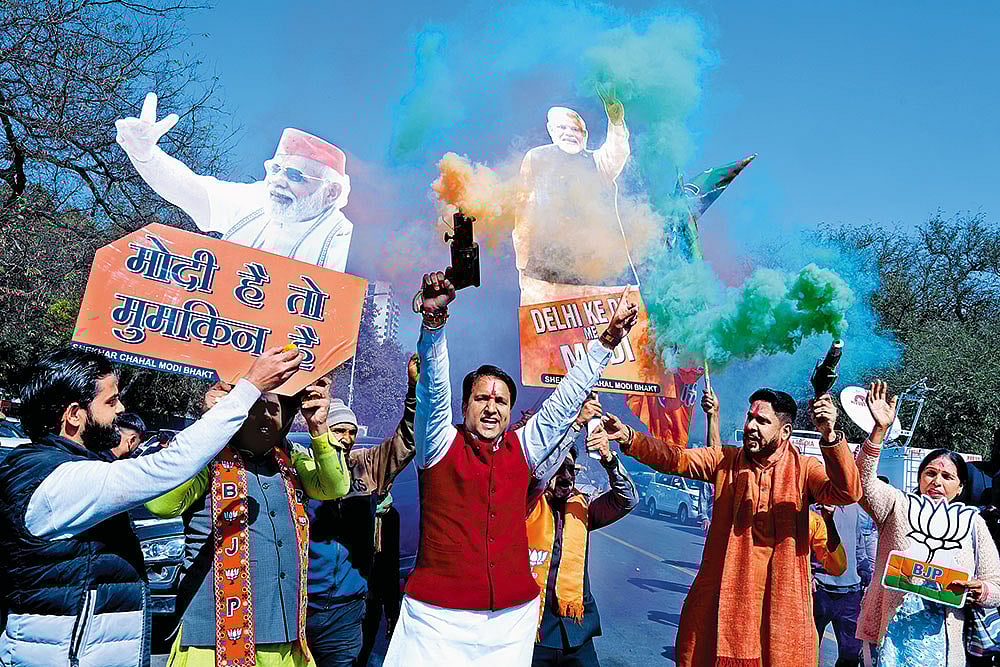| Photo: Tribhuvan Tiwari : Back After 27 Years: Supporters of the BJP celebrating outside the  party office in Delhi