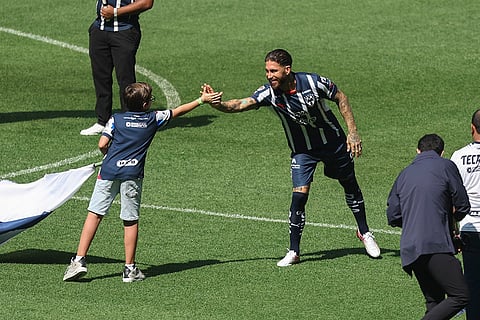 Mexico Football League: Sergio Ramos shakes a young fan's hand