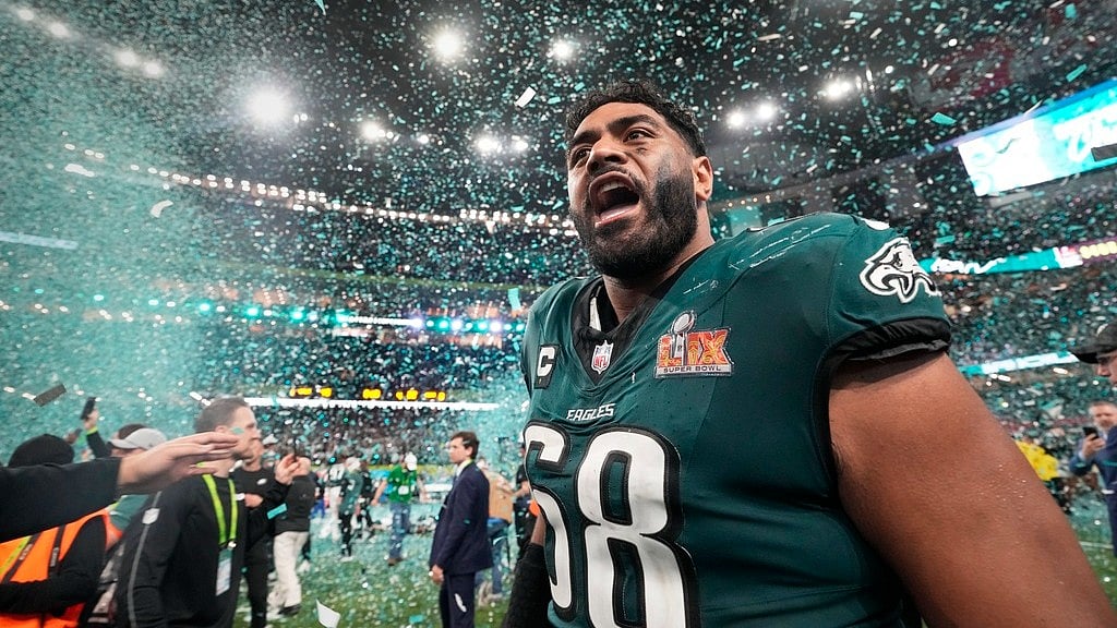 AP/Doug Benc : Philadelphia Eagles tackle Jordan Mailata celebrates after defeating the Kansas City Chiefs in the NFL Super Bowl.