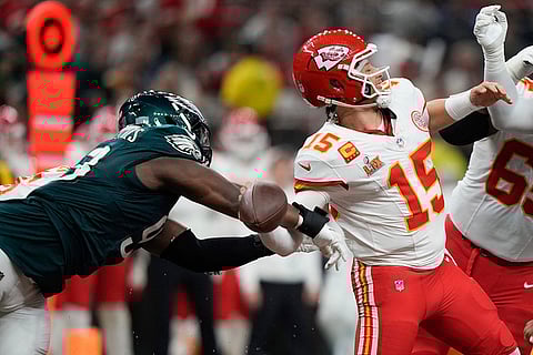 Super Bowl LIX, Eagles vs Chiefs: Eagles defensive tackle Milton Williams strips the ball from Chiefs quarterback Patrick Mahomes