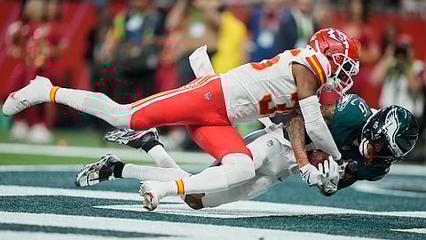 Super Bowl LIX, Eagles vs Chiefs: Eagles wide receiver DeVonta Smith, right, catches a touchdown pass as Chiefs cornerback Jaylen Watson