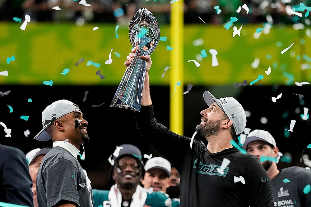 | Photo: AP/Matt Slocum : Super Bowl LIX, Eagles vs Chiefs: Philadelphia Eagles head coach Nick Sirianni, right, lifts the Vince Lombardi Trophy 