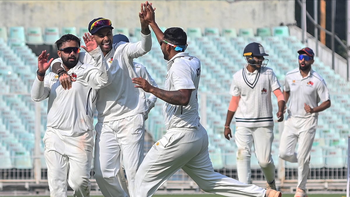 PTI : Shams Mulani celebrates with Suryakumar Yadav and others after taking the wicket of Haryana's Himanshu Rana during a Ranji trophy quarterfinal cricket match.
