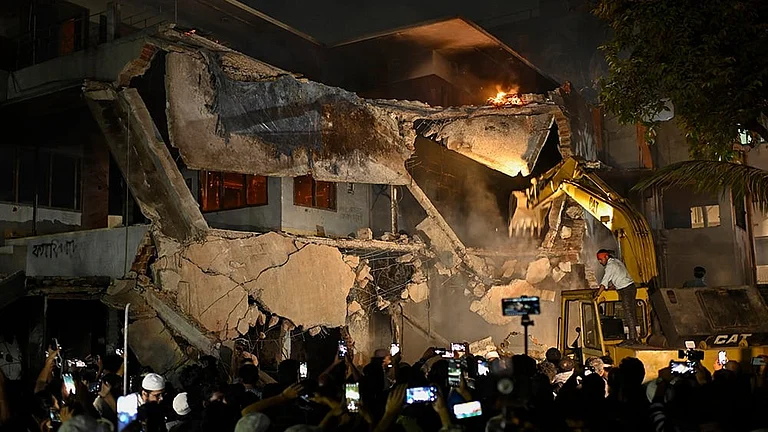 Bangladesh Protest: Sheikh Mujibur Rahman’s House demolished - | Photo: AP/Mahmud Hossain Opu