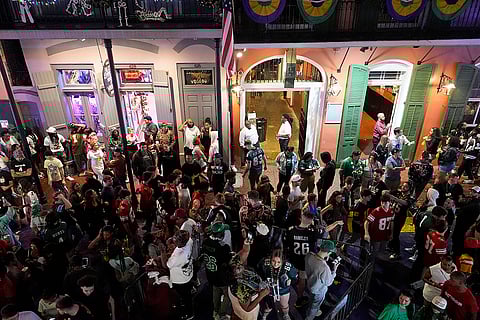 NFL Super Bowl 59 football, Eagles vs Chiefs: Eagles fans celebrate in the French Quarter after the NFL Super Bowl 59 