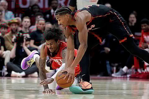 NBA 2024-25: Rockets guard Jalen Green and Raptors guard Ochai Agbaji chase the ball