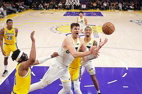 NBA 2024-25: Jazz center Walker Kessler shoots