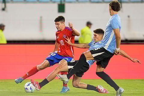 CONMEBOL U20 Championship: Uruguay's Patricio Pacifico tackles Chile's Agustin Arce