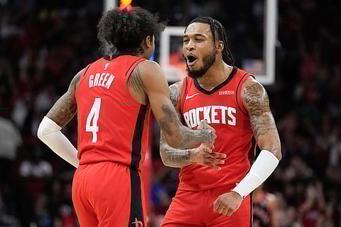 NBA 2024-25: Rockets forward Cam Whitmore celebrates with Jalen Green after Green's 3-point basket