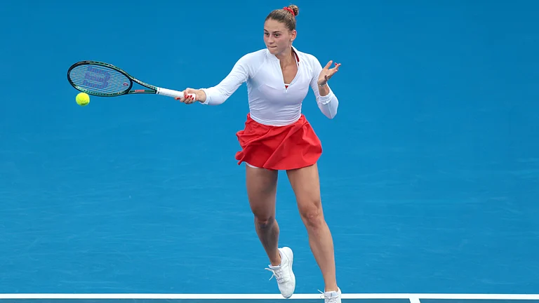 Marta Kostyuk in action against Coco Gauff - null