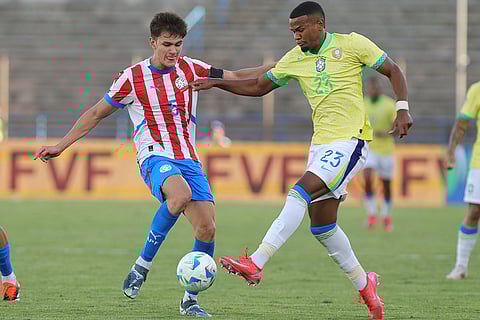 CONMEBOL U20 Championship: Paraguay's Lucas Quintana and Brazil's Allison Santana fight for the ball