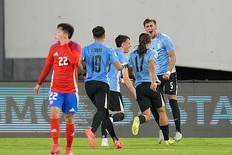 CONMEBOL U20 Championship: Uruguay's Juan Rodriguez celebrates with teammates after scoring his side's opening goal