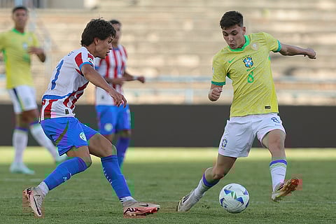 CONMEBOL U20 Championship: Paraguay's Octavio Alfonso and Brazil's Breno Bidon fight for the ball 