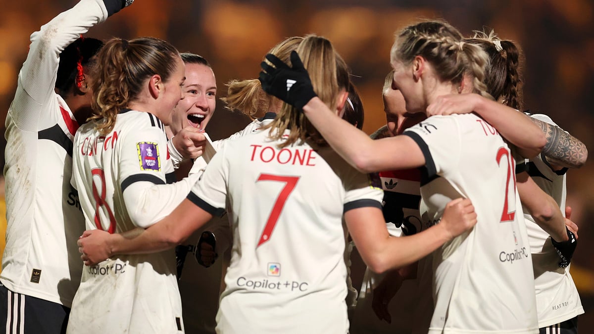 Aoife Mannion of Manchester United celebrates scoring against Wolves