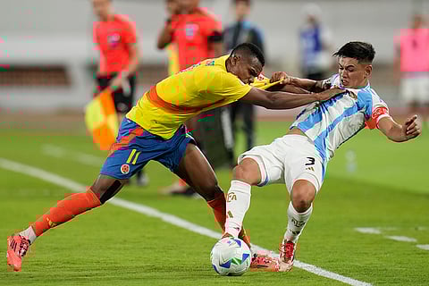 CONMEBOL U20 Championship: Argentina's Julio Soler and Colombia's Andy Batioja fight for the ball 
