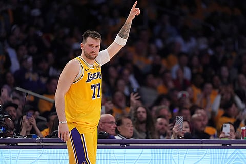NBA 2024-25: Lakers guard Luka Doncic gestures