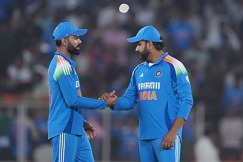 IND vs ENG 3rd ODI: India's captain Rohit Sharma, right, and Virat Kohli celebrate after winning the match