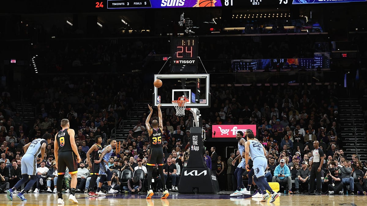 Kevin Durant #35 of the Phoenix Suns shoots a free throw shot to score his 30,000th career point during the second half of the NBA game against the Memphis Grizzlies at Footprint Center on February 11, 2025 in Phoenix, Arizona.