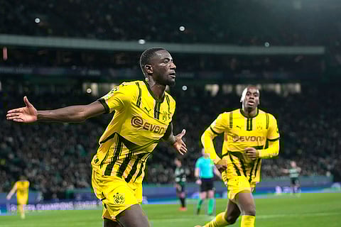 Champions League playoff first leg: Dortmund's Serhou Guirassy celebrates after scoring his side's opening goal